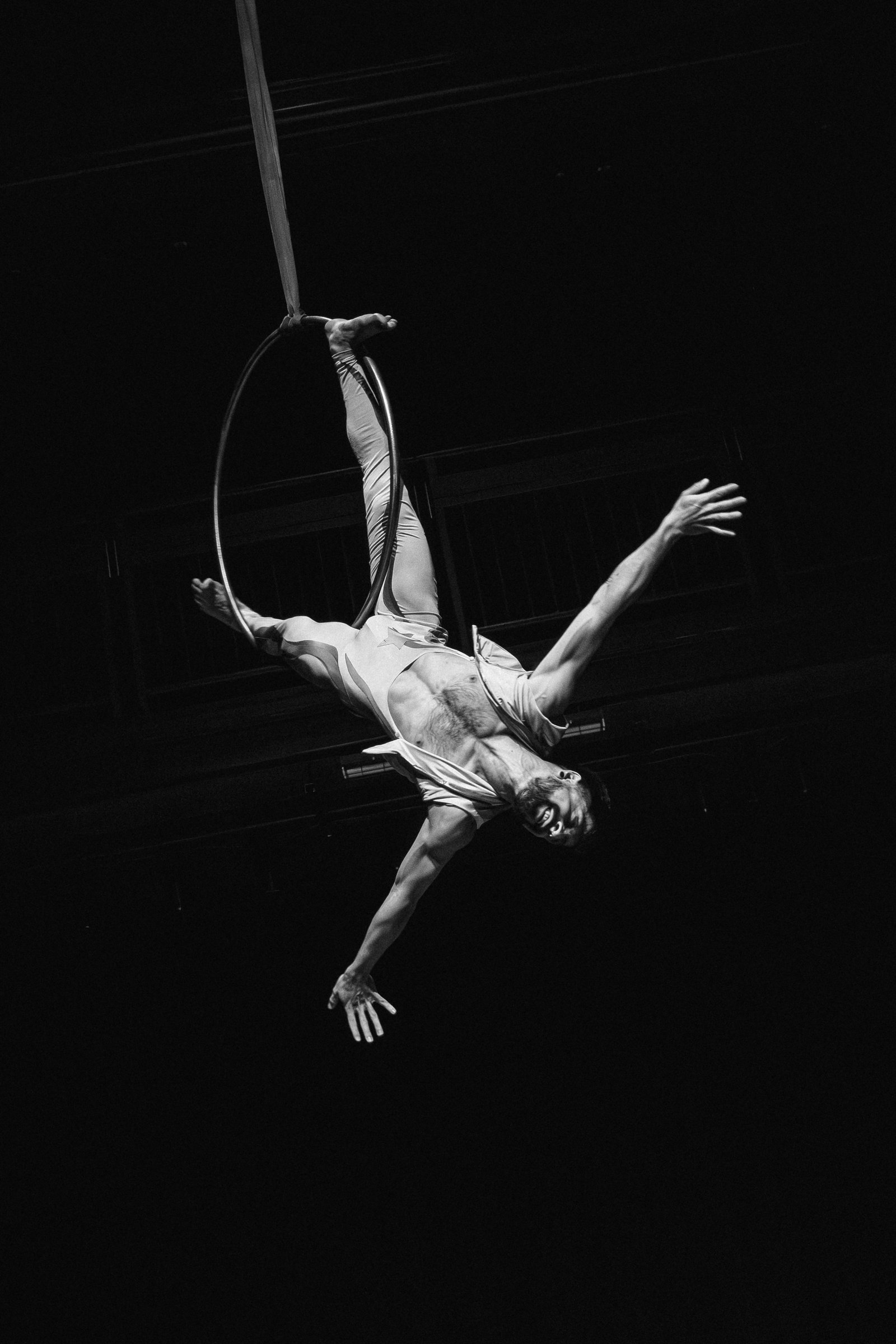 Hooman performing with aerial hoop